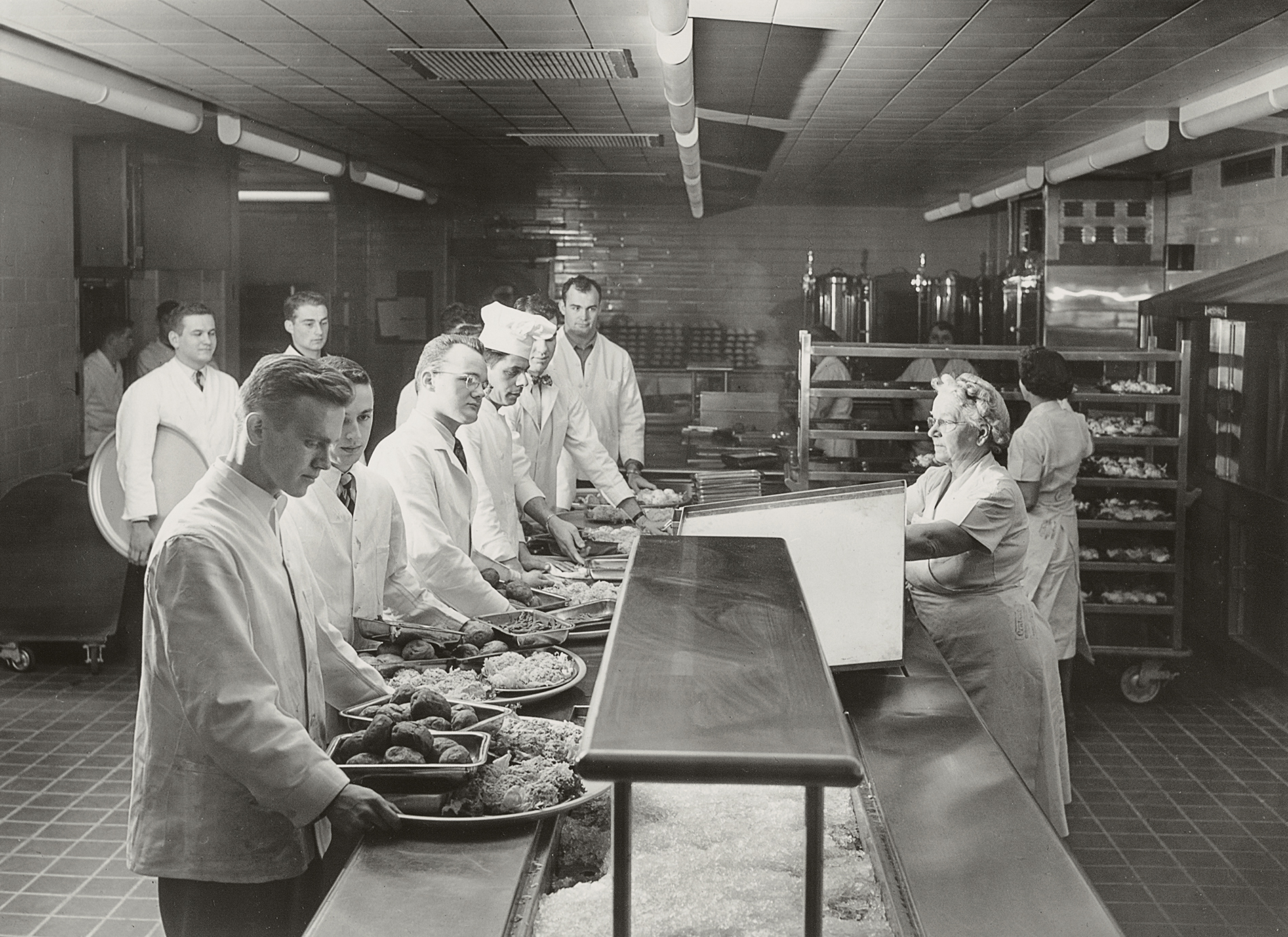 waiters wait for food in the Ratty kitchen